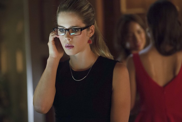 Emily Bett Rickards wearing glasses