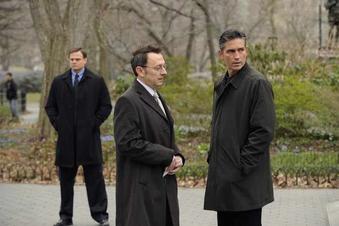 Michael Emerson and two men in a park