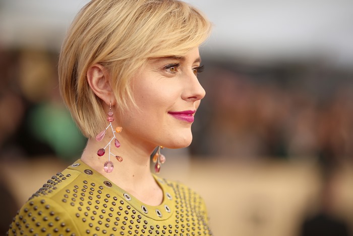 Greta Gerwig wearing earrings