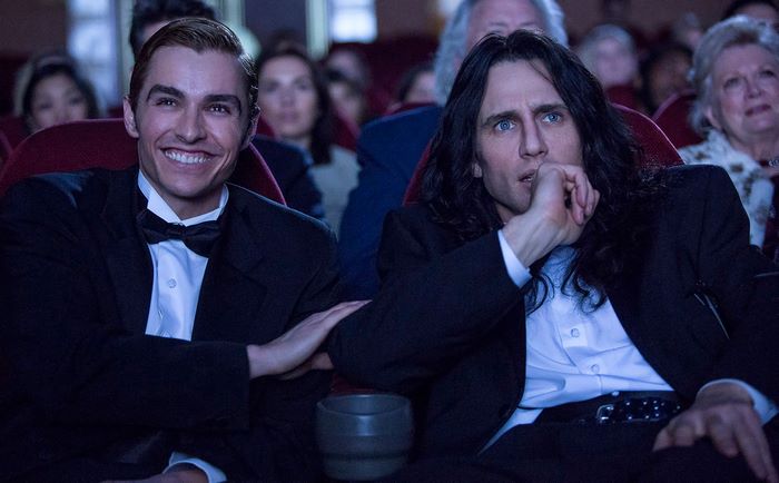 Dave Franco and Tommy Wiseau in a movie theater