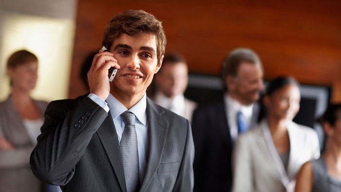Dave Franco on a business call