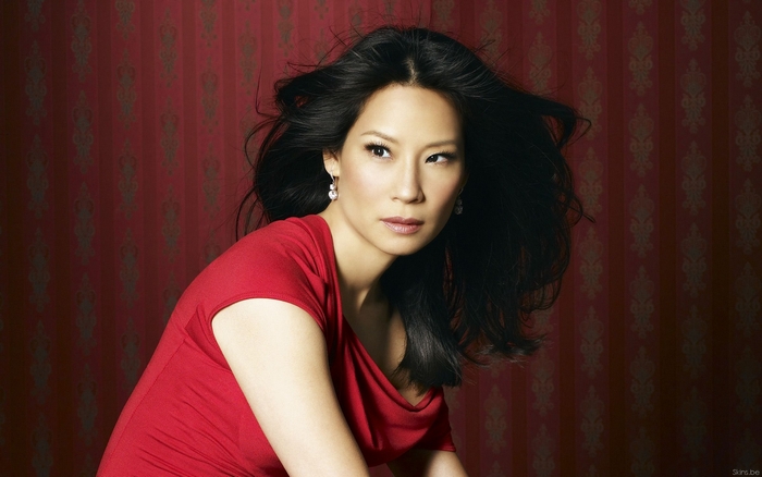 Lucy Liu in a red dress