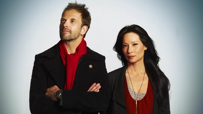 Jonny Lee Miller and Lucy Liu from Elementary