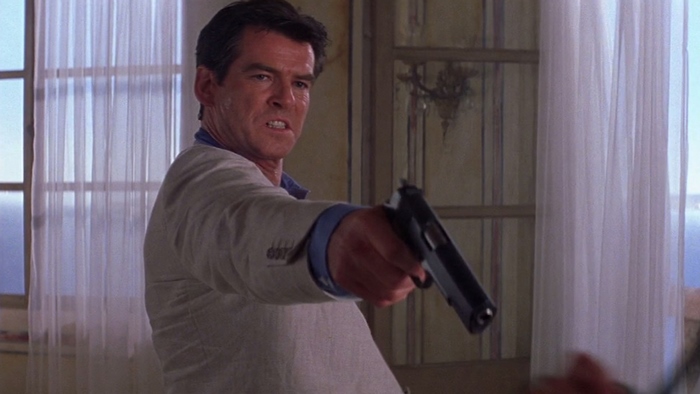 Pierce Brosnan as James Bond holding a gun