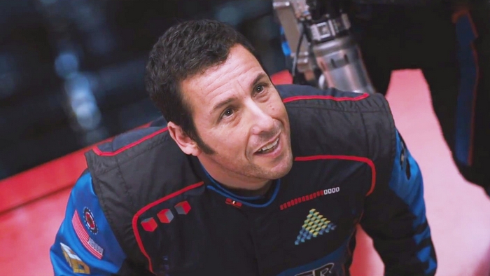 Adam Sandler in a racing suit