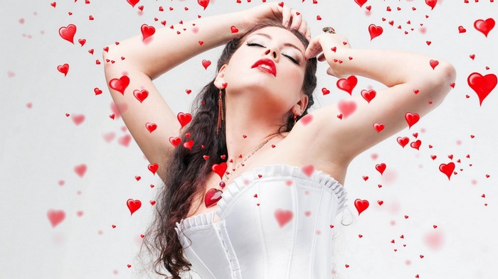 Woman in white corset surrounded by hearts