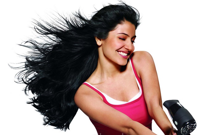 Anushka Sharma with a hairdryer