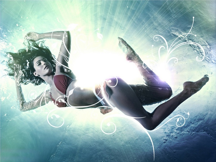 Kelly Brook underwater with light effects