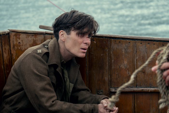Cillian Murphy in a military uniform on a boat