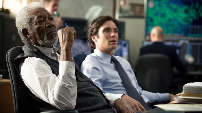 Morgan Freeman and Cillian Murphy in a meeting