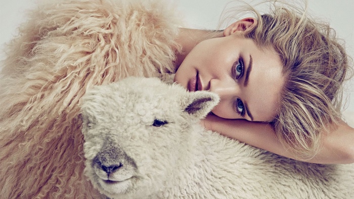 Woman and lamb with fluffy textures