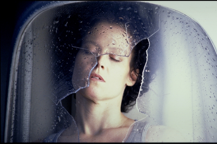 Sigourney Weaver in a cracked helmet