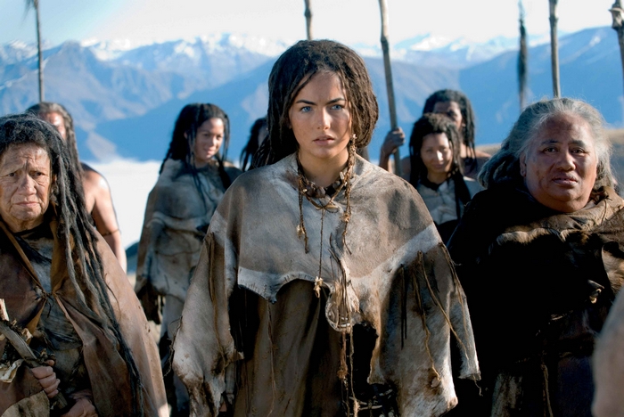 Camilla Belle and group in primitive attire