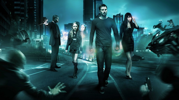 Camilla Belle and others in a futuristic city