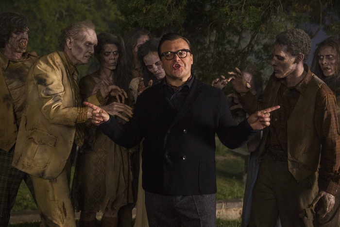 Jack Black surrounded by zombies