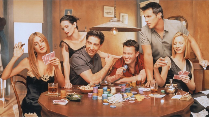 Friends cast playing poker