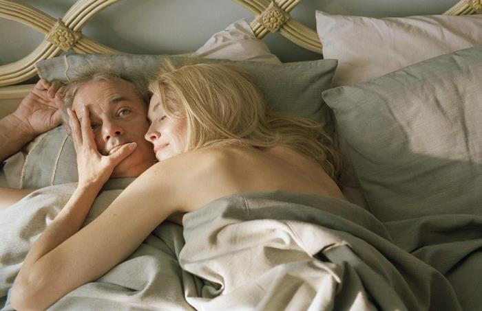 Sharon Stone and man in bed