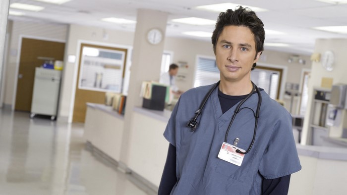 Zach Braff in a hospital hallway