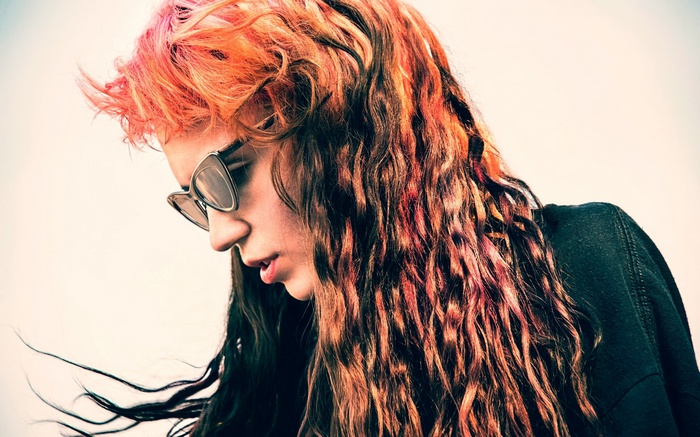 Woman with colorful hair and sunglasses