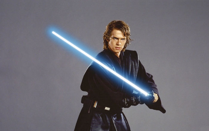 Anakin Skywalker from Star Wars holding a lightsaber