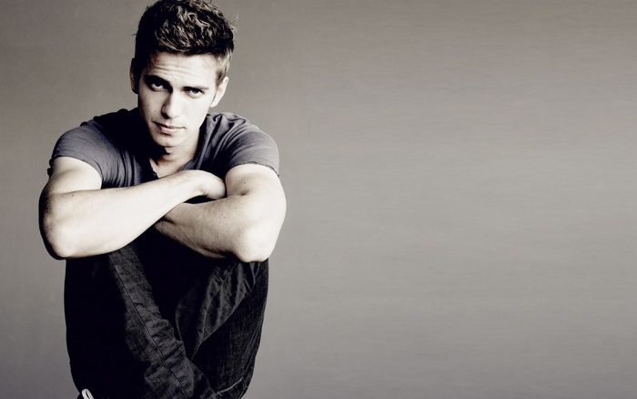 Hayden Christensen sitting