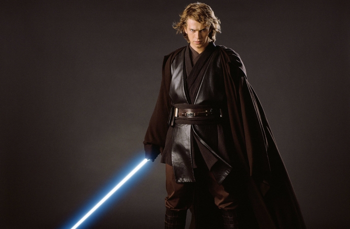 Anakin Skywalker from Star Wars holding a lightsaber