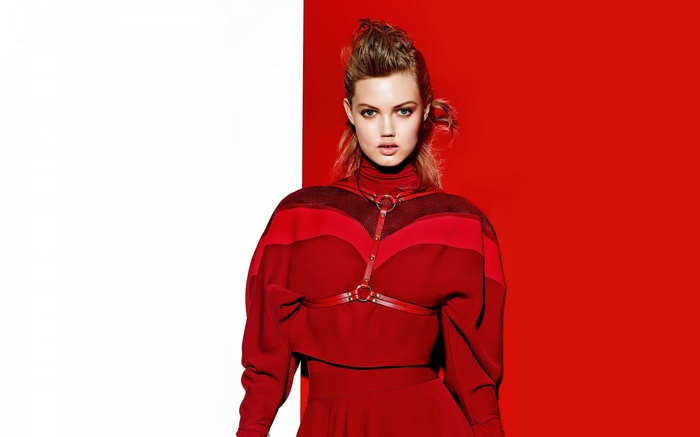 Woman in red outfit with harness