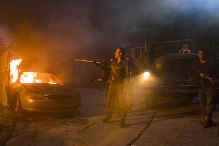 Jeffrey Dean Morgan with burning car and truck