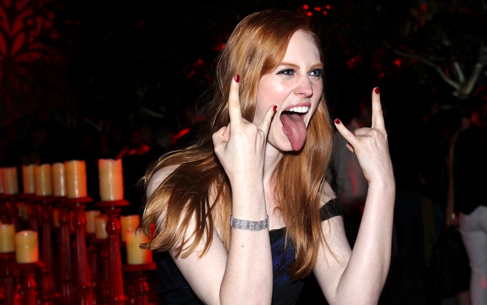 Deborah Ann Woll making rock on gesture
