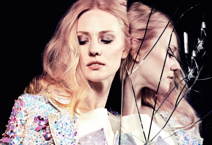 Deborah Ann Woll reflected in broken mirror