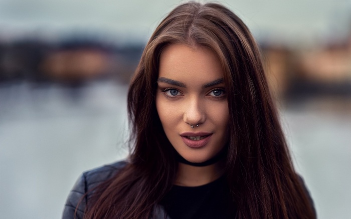 Woman with nose ring and choker