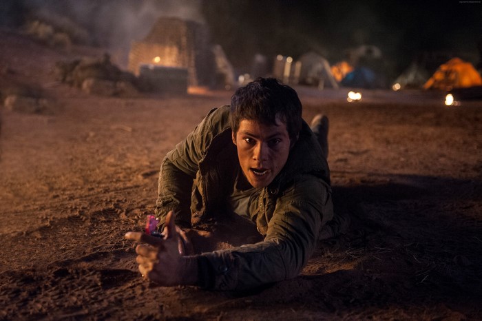 Dylan O'Brien crawling on the ground