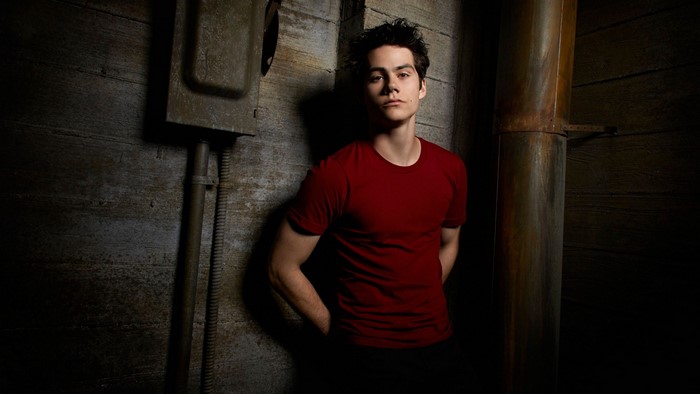 Dylan O'Brien in a red t-shirt