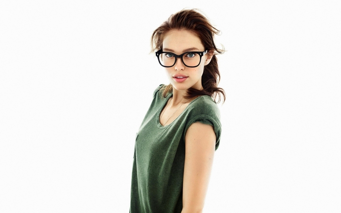 Emily DiDonato wearing glasses and a green t-shirt