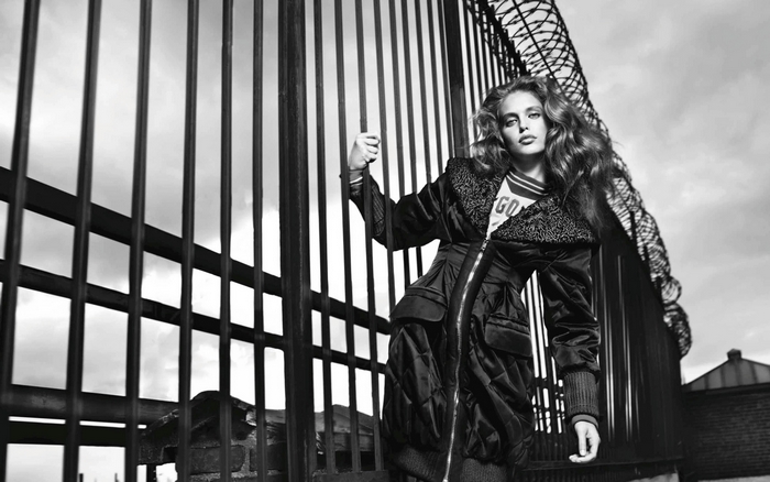 Emily DiDonato by a fence
