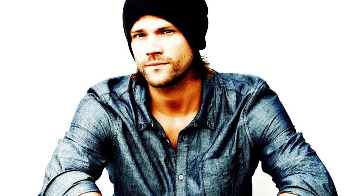 Jared Padalecki wearing a beanie and denim shirt
