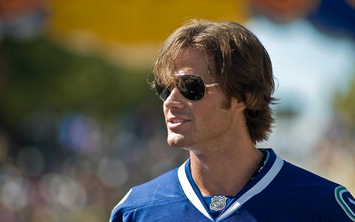 Jared Padalecki wearing a Vancouver Canucks jersey