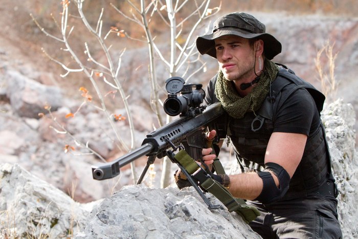 Liam Hemsworth with sniper rifle