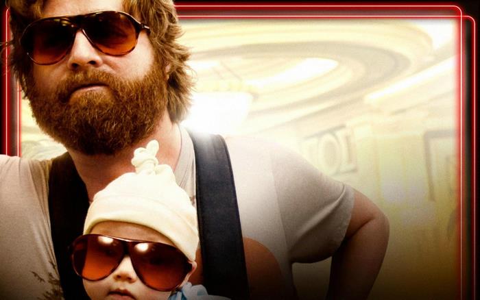 Zach Galifianakis with a baby