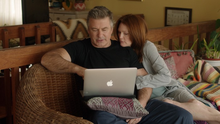 Alec Baldwin and Julianne Moore on a couch