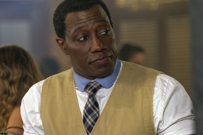 Wesley Snipes in a vest and tie
