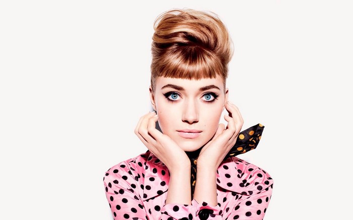 Imogen Poots in a pink polka dot outfit