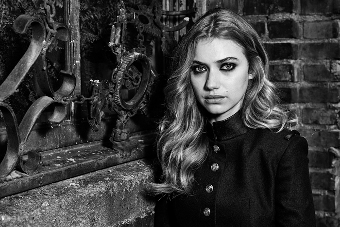 Imogen Poots in black coat