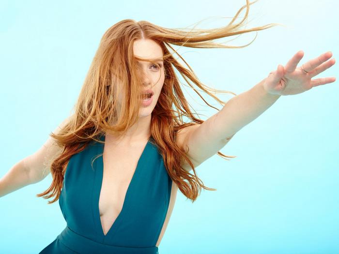 Holland Roden with red hair and teal dress