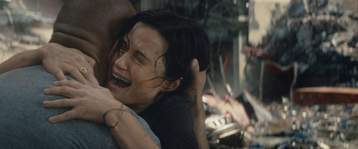 Carla Gugino in a scene of destruction