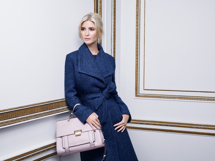 Ivanka Trump in Blue Coat with Pink Handbag