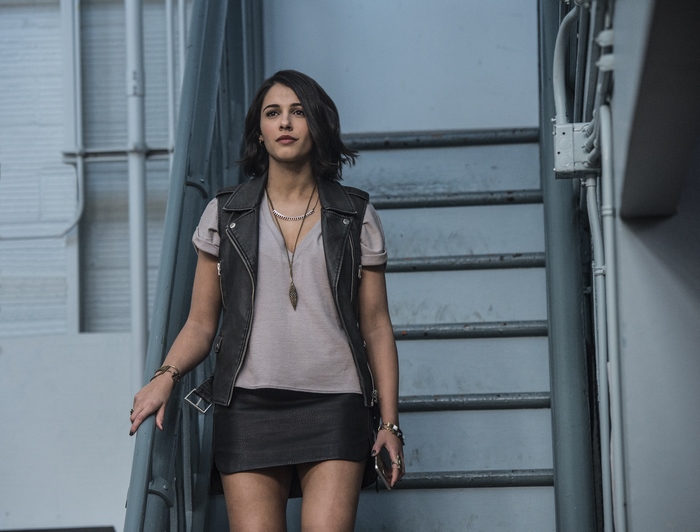 Naomi Scott on stairs