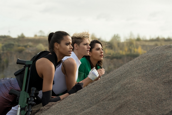 Naomi Scott and two women with a sniper rifle