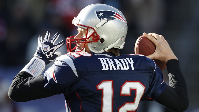 Tom Brady throwing a football