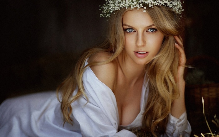 Woman with flower crown lying down